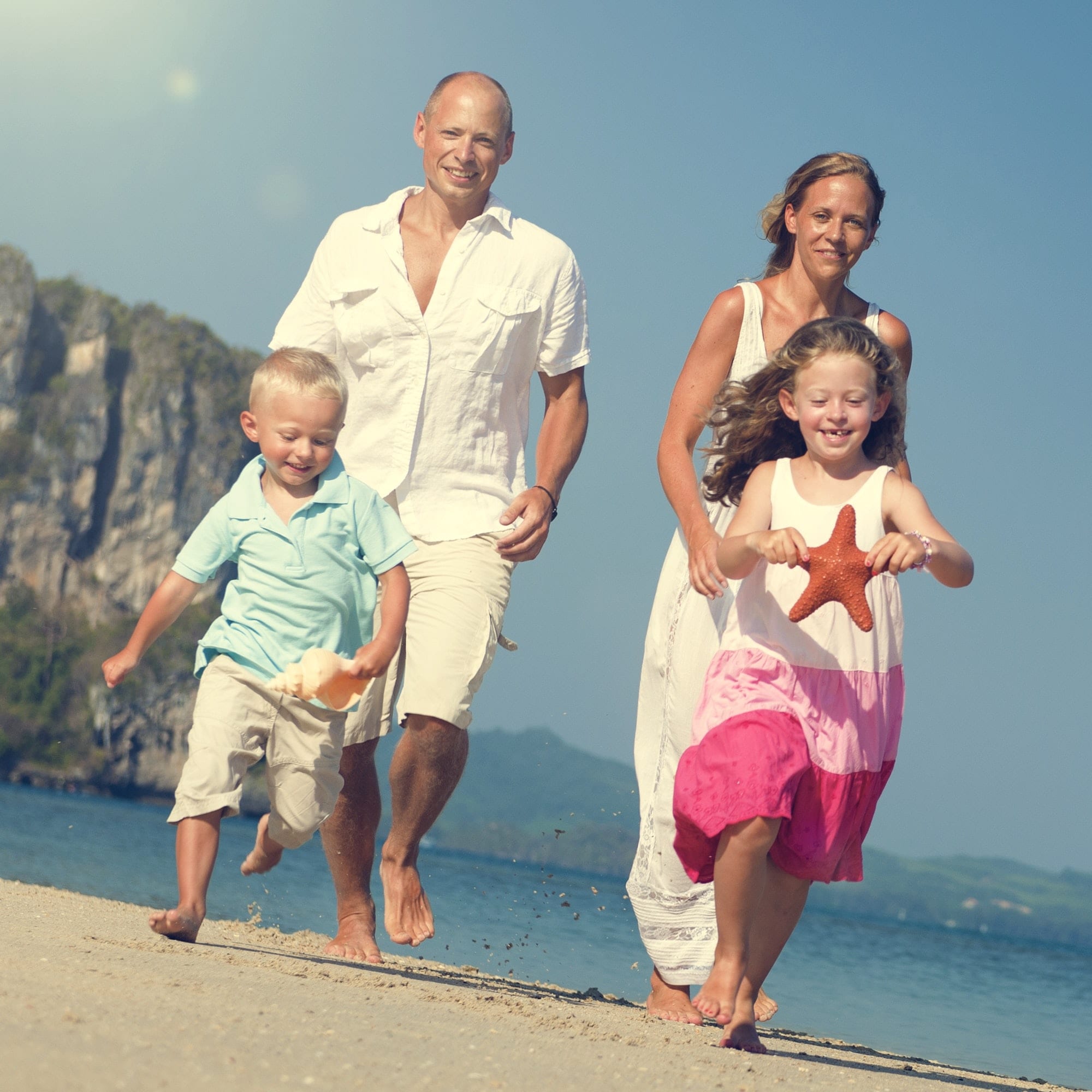 Family Father Mother Son Daughter Beach Fun Concept